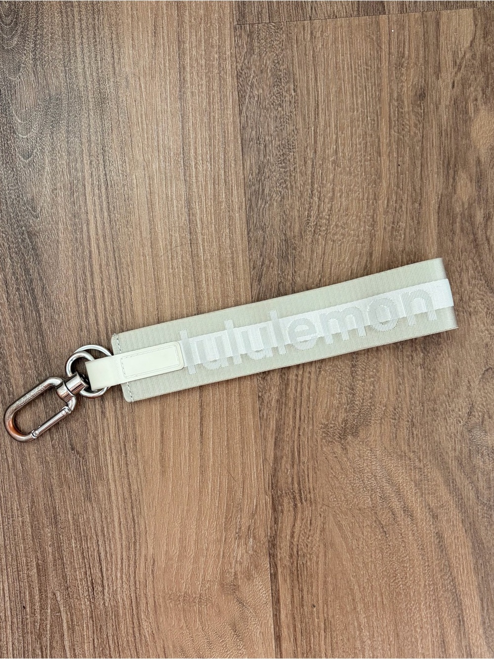 lululemon cream logo keychain wristlet